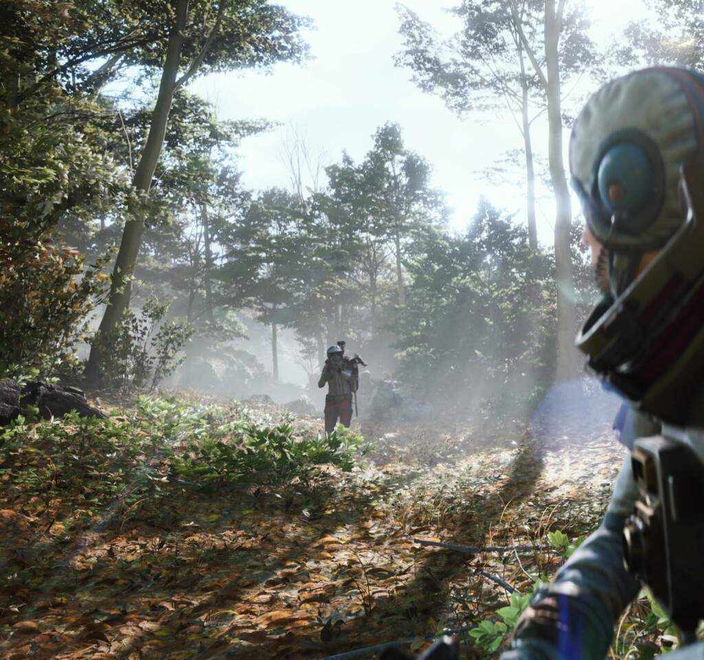 A lone raider traverses a sunlit forest clearing while a teammate watches from behind.