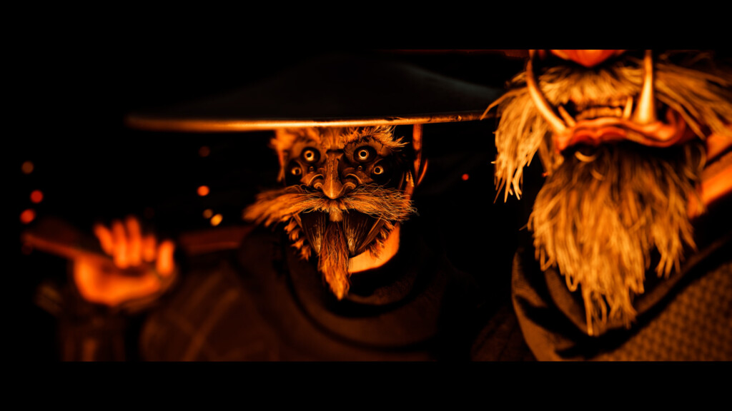 Masked bandits with straw hats illuminated by firelight in the Ghost of Yōtei